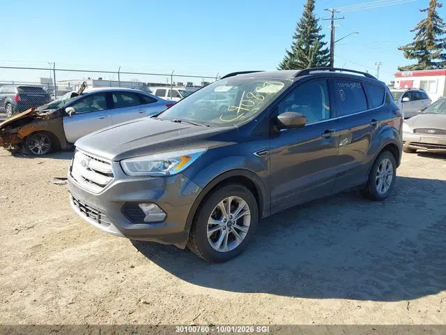 2017 Ford ESCAPE SE VIN 1FMCU9GD5HUC90881 фото 2
