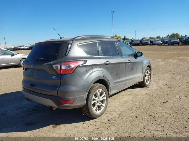 2017 Ford ESCAPE SE VIN 1FMCU9GD5HUC90881 фото 4