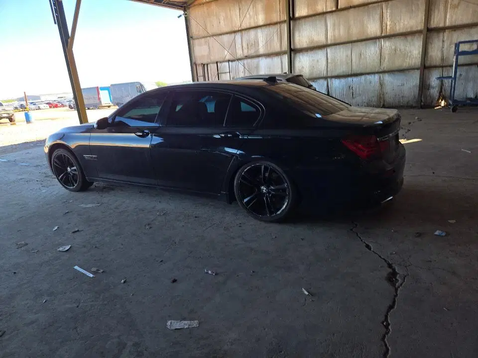 2014 BMW 740 VIN WBAYE4C50ED138024 фото 2