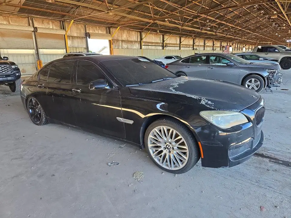 2014 BMW 740 VIN WBAYE4C50ED138024 фото 4