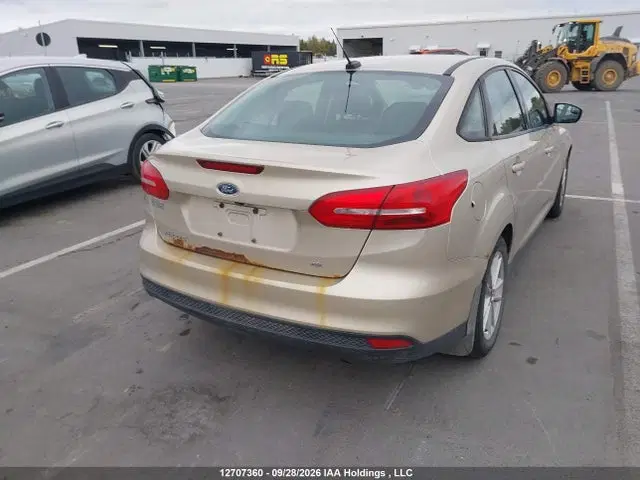 2017 Ford Focus VIN 1FADP3F21HL320886 фото 4