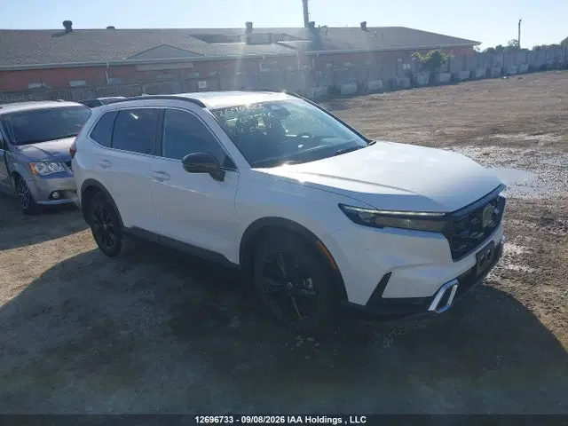 2HKRS6H92RH219596 — 2024 Honda CR-V Sport Touring, Град, фото до ремонта