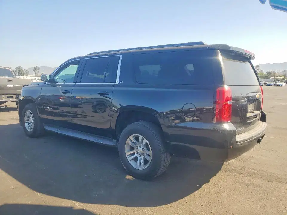 2019 Chevrolet Suburban VIN 1GNSCHKC3KR124646 фото 2