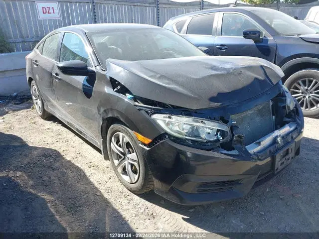 2HGFC2F52JH011323 — 2018 Honda Civic LX, передняя часть, фото до ремонта