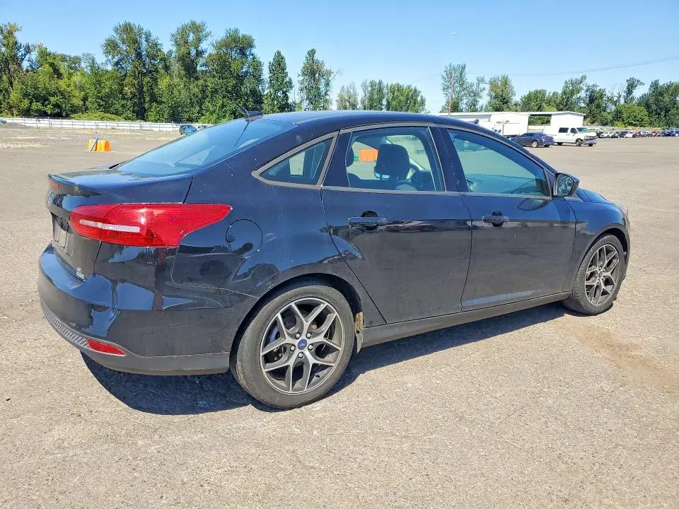 2018 Ford Focus VIN 1FADP3FE6JL313805 фото 3