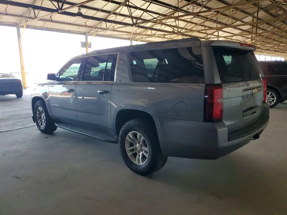 2019 Chevrolet Suburban VIN 1GNSKHKCXKR401635 фото 2
