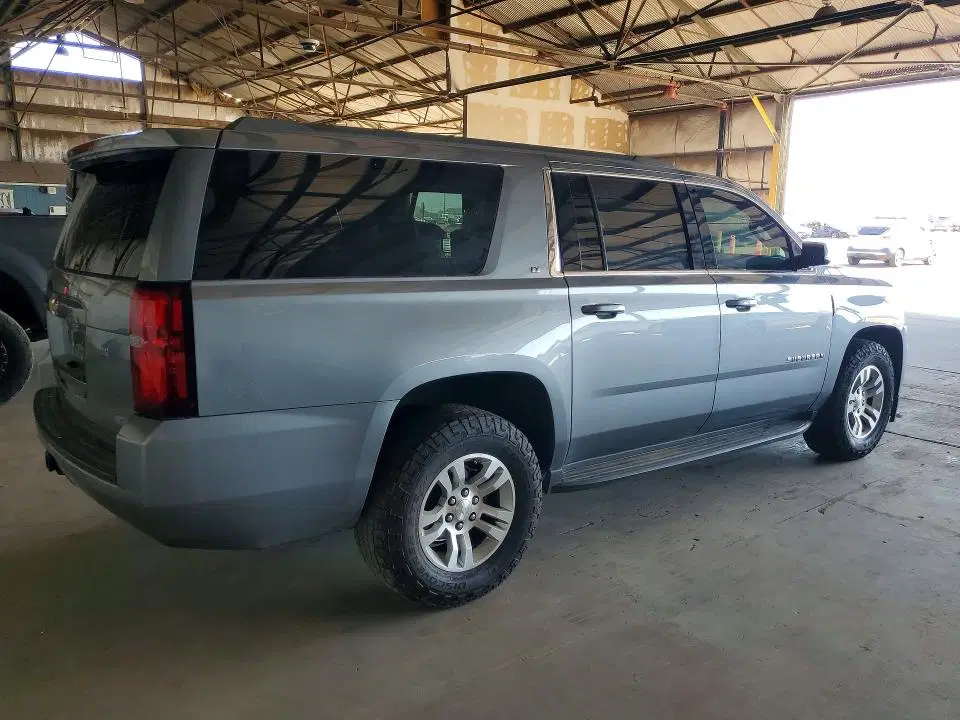2019 Chevrolet Suburban VIN 1GNSKHKCXKR401635 фото 3