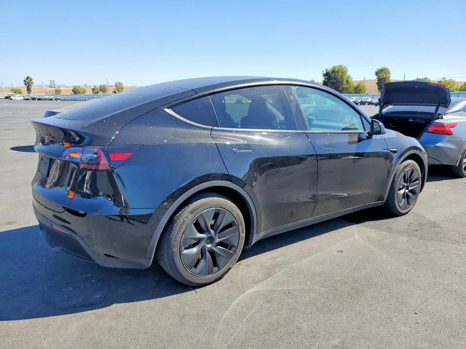 2024 Tesla Model Y VIN 7SAYGDED8RF123452 фото 3