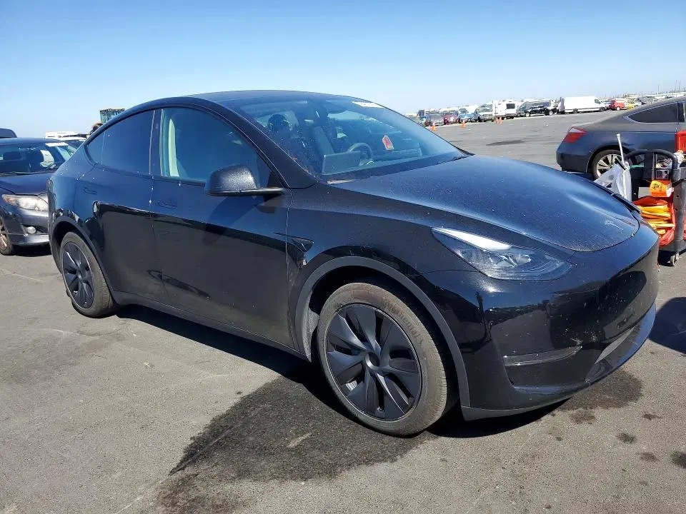 2024 Tesla Model Y VIN 7SAYGDED8RF123452 фото 4