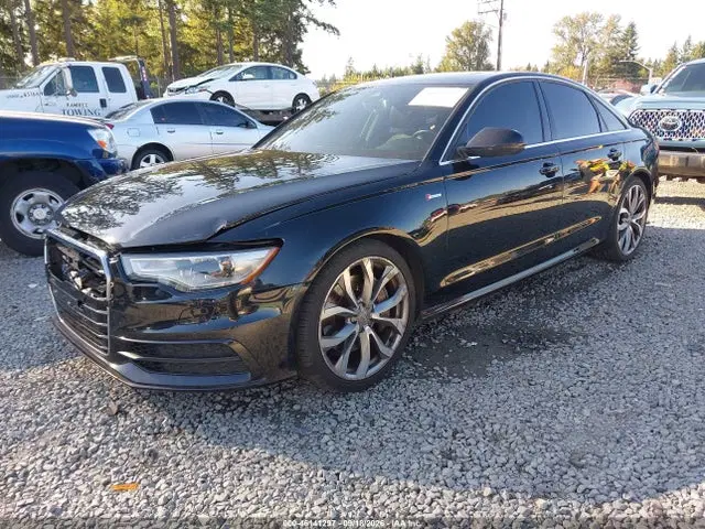 2014 Audi A6 3.0t Premium Plus VIN WAUHGAFCXEN034931 фото 2