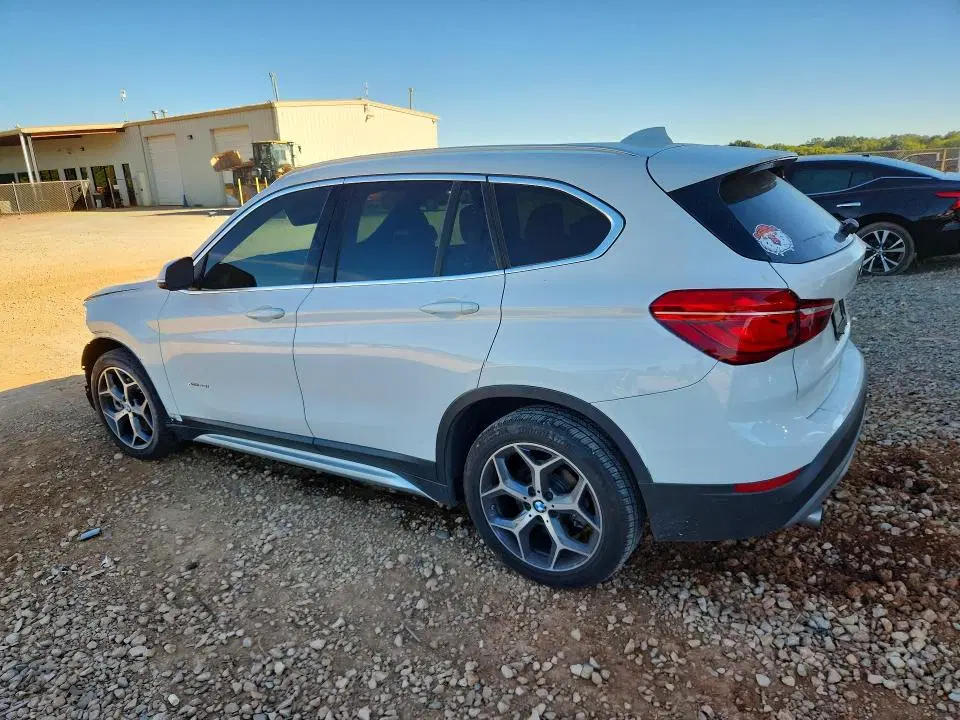 2017 BMW X1 VIN WBXHT3Z35H4A65302 фото 2