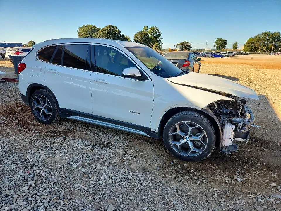 2017 BMW X1 VIN WBXHT3Z35H4A65302 фото 4