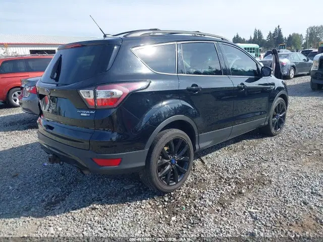 2017 Ford Escape Titanium VIN 1FMCU9J91HUD43001 фото 4