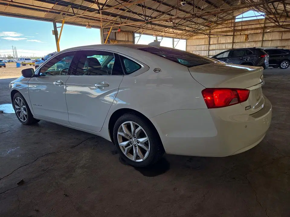 2016 Chevrolet Impala VIN 2G1105SA5G9185257 фото 2