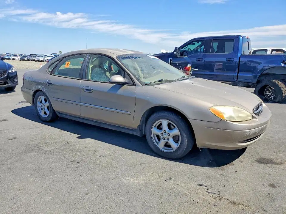 2003 FORD TAURUS VIN 1FAFP53U33A182735 фото 4