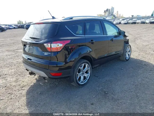 2018 Ford Escape Titanium VIN 1FMCU9J98JUA45471 фото 4
