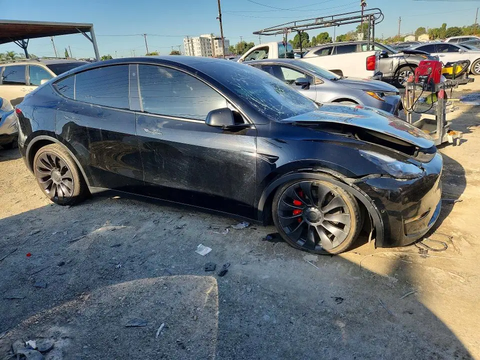 2022 Tesla Model Y VIN 7SAYGDEFXNF338505 фото 4