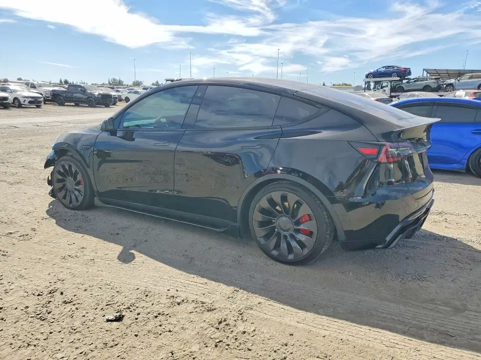 2023 Tesla Model Y VIN 7SAYGDEFXPF702988 фото 2