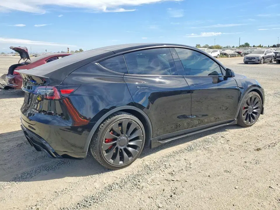 2023 Tesla Model Y VIN 7SAYGDEFXPF702988 фото 3