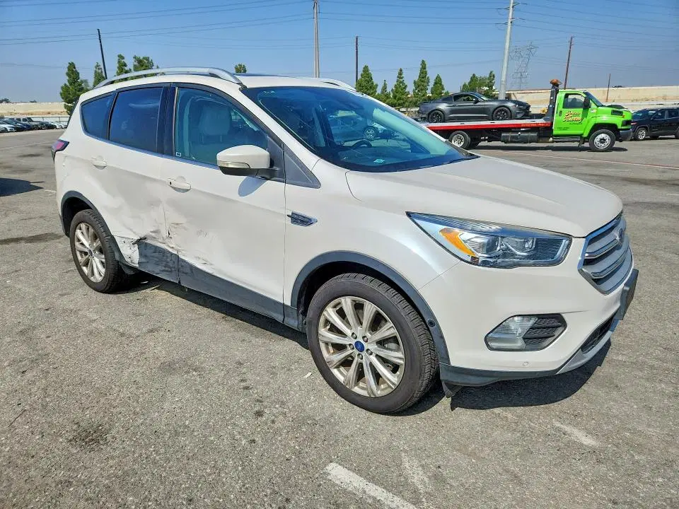 2018 Ford Escape VIN 1FMCU9J9XJUA24668 фото 4
