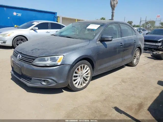 2014 Volkswagen Jetta 1.8t Sel VIN 3VWL17AJ4EM387437 фото 2