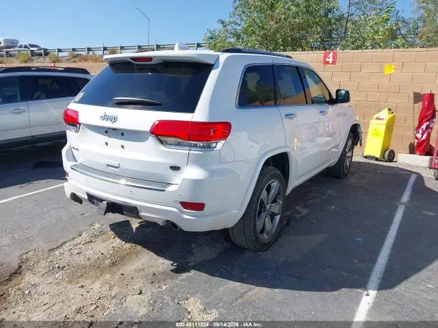 2014 Jeep Grand Cherokee Overland VIN 1C4RJFCG6EC302754 фото 4