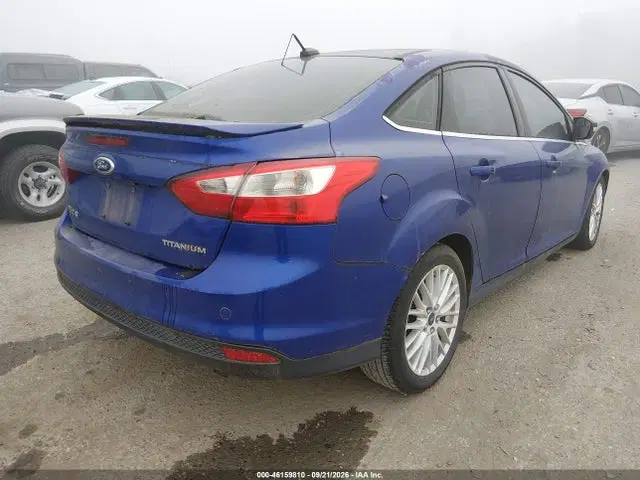 2014 Ford Focus Titanium VIN 1FADP3J24EL312249 фото 4