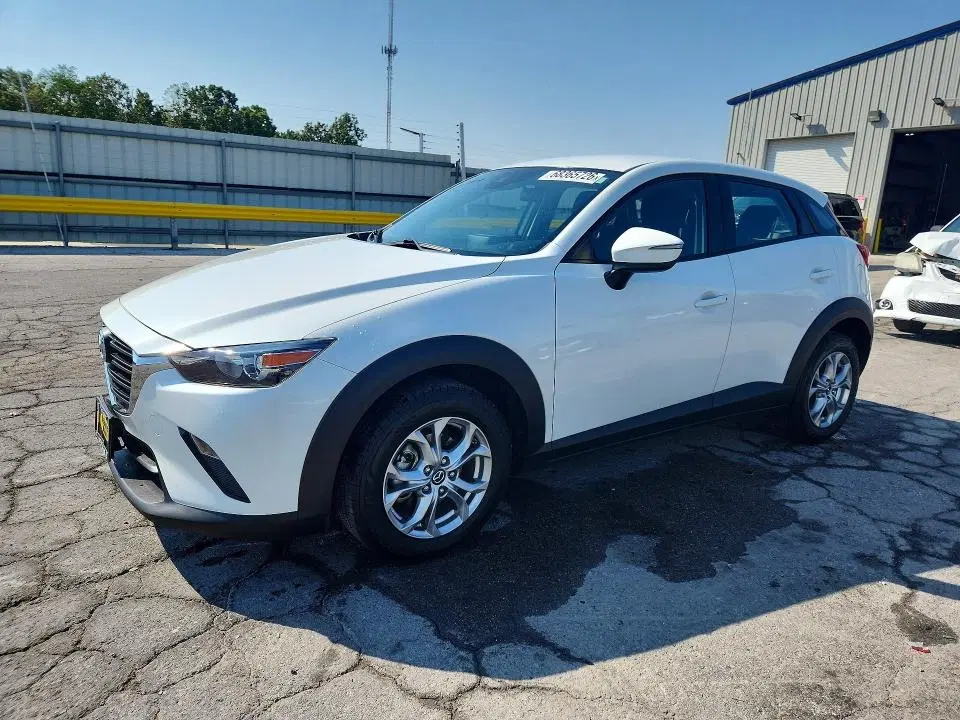 JM1DKDB73K0435272 — 2019 Mazda CX-3, град, фото до ремонта