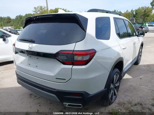 2023 Honda Pilot Touring VIN 5FNYG1H70PB500774 фото 4